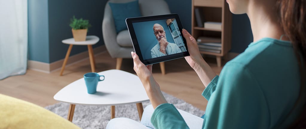 Woman having a video call with her doctor
