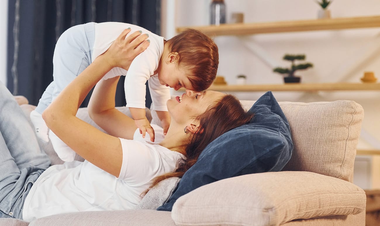 Conception of parenting. Mother with her little daughter is at home together